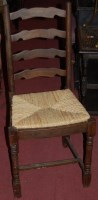 Lot 1254 - A set of ten Lancashire style ladderback rush...