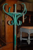 Lot 1257 - A rustic green painted metal hat stand, height...