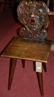 Lot 1261 - An early 20th century relief carved walnut...
