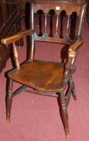 Lot 1359 - An early 20th century elm and fruitwood elbow...
