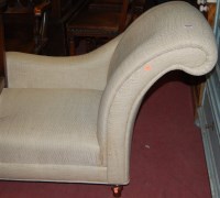 Lot 1361 - A contemporary cream upholstered chaise-longue,...
