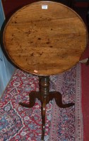 Lot 1396 - An early 19th century provincial elm circular...