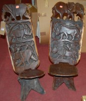Lot 1416 - Three various African low relief carved teak X-...
