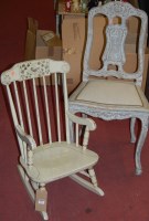 Lot 1421 - A child's floral painted stick back rocking...