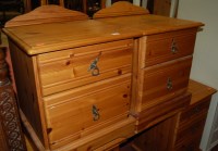 Lot 1426 - A pair of modern pine ledgeback two drawer...