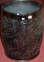 Lot 1427 - A pierced and embossed floral decorated metal...