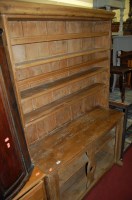 Lot 1443 - A 19th century rustic pine dresser the upper...