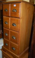 Lot 1445 - A modern pine square front chest of two short...