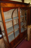 Lot 1451 - An Edwardian mahogany and flame mahogany...