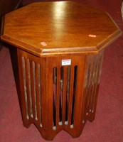 Lot 1459 - An Arts & Crafts walnut octagonal low...