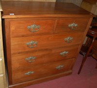 Lot 1462 - An Edwardian walnut square front chest of two...