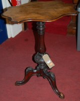 Lot 1468 - A Victorian figured walnut shaped top fixed...