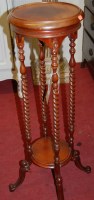 Lot 1470 - A contemporary hardwood circular two tier...