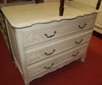 Lot 1471 - A contemporary French limed oak chest of three...