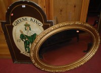 Lot 1472 - A giltwood oval wall mirror, together with a...
