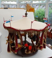 Lot 1512 - A Steiff 'Millennium Carousel', based on an...