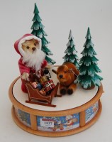 Lot 1537 - A Steiff teddy-bear group Santa and his...