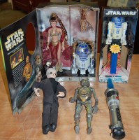 Lot 1570 - A collection of Star Wars related collectables,...