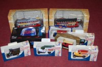 Lot 1590 - A collection of boxed diecast vehicles, to...