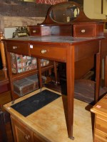 Lot 1435 - An early 20th century mahogany and leather...