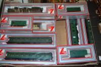 Lot 1621 - Ten boxed Lima 00 gauge coaches and wagons, to...