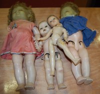 Lot 1648 - A box of dolls to include mainly plastic...