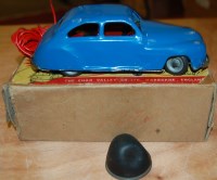 Lot 1665 - A Chad Valley remote control tinplate Harborne...