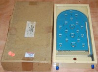 Lot 1612 - A boxed Chad Valley miniature Bagatelle,...