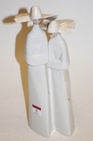 Lot 4 - A large Lladro figure group of two nuns,...