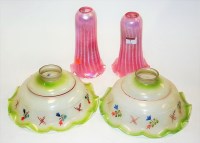 Lot 7 - A pair of Monart style iridescent frilled...