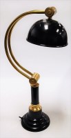 Lot 14 - A modern lacquered brass and black painted...