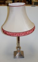 Lot 16 - A reproduction silver plated Corinthian column...