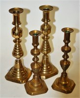 Lot 25 - A pair of 19th century turned brass...