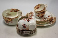 Lot 32 - A Victorian part tea service, on a white...