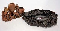 Lot 49 - A soapstone figure group carved with monkeys...