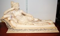 Lot 50 - A mid-20th century *cast resin* figure of a...