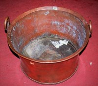 Lot 81 - A large 19th century copper twin handled pan,...