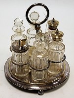 Lot 96 - An early 20th century silver plated six bottle...