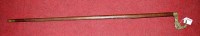 Lot 107 - A mid 20th century hardwood walking cane...