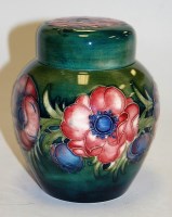 Lot 179 - A Moorcroft pottery ginger jar and cover on a...
