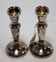 Lot 197 - A pair of modern silver dwarf table...