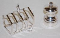 Lot 226 - A George VI silver four division toast rack by...