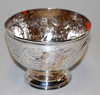Lot 228 - An Edwardian silver table bowl having all over...