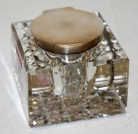 Lot 230 - A George V cut glass silver topped inkwell...
