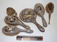 Lot 241 - A pair of Edwardian silver backed hand brushes...