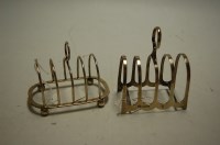 Lot 274 - A George V silver four division toast rack by...