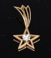 Lot 321 - A 14ct gold and diamond set star pendant, 1g,...