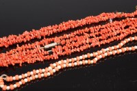 Lot 334 - A beaded coral and small cultured pearl choker;...