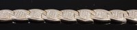 Lot 351 - A modern silver gilt bracelet, the wavy links...