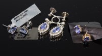 Lot 359 - A pair of 9ct white gold and trilliant cut...